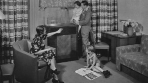 A mother and father and their two young children gather in the living room around their new Carrier air conditioning unit in the 1940's. (Photo by Archive Photos/Getty Images)
